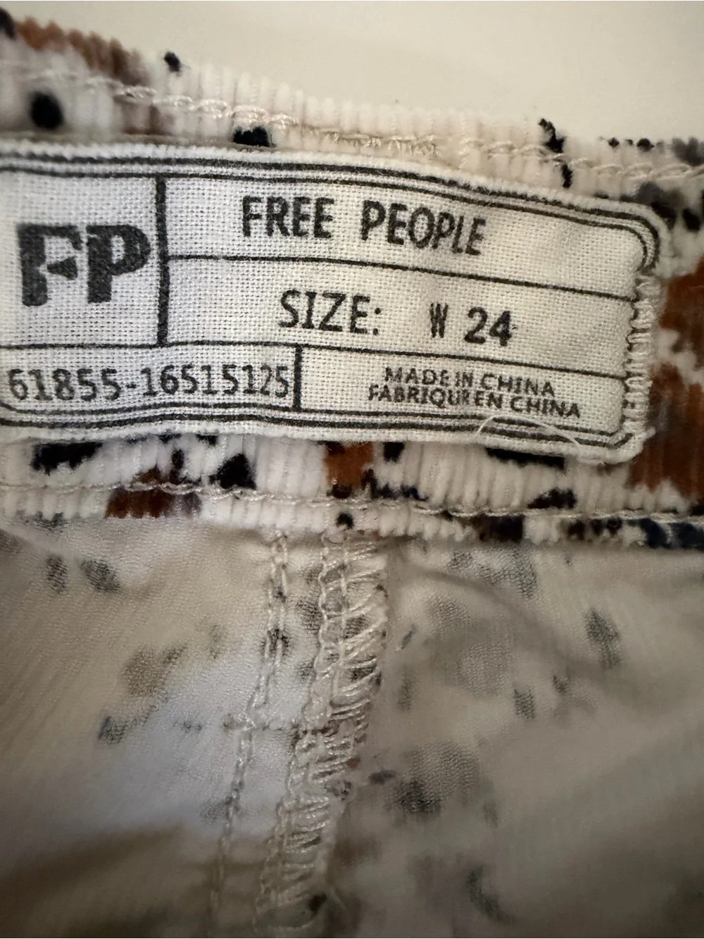 Free People White Floral Jean Shorts with Brown & Black Print